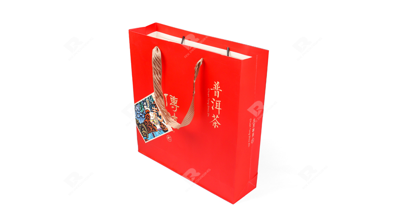 RX Packaging Designs a Striking Red Gift Bag for a Premium Pu'er Tea Brand