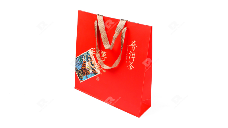RX Packaging Designs a Striking Red Gift Bag for a Premium Pu'er Tea Brand