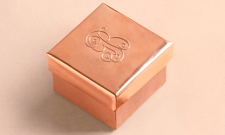 What kinds of embossing processes are commonly used in gift box packaging