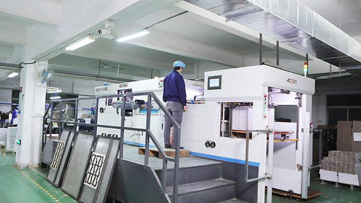 What equipment is needed for the packaging box production process?